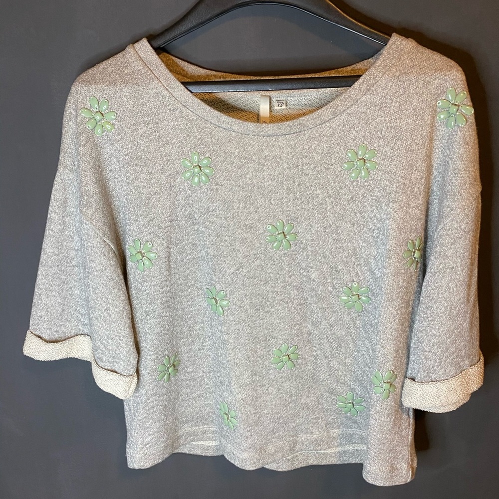 Upgraded pullover with raw hem.